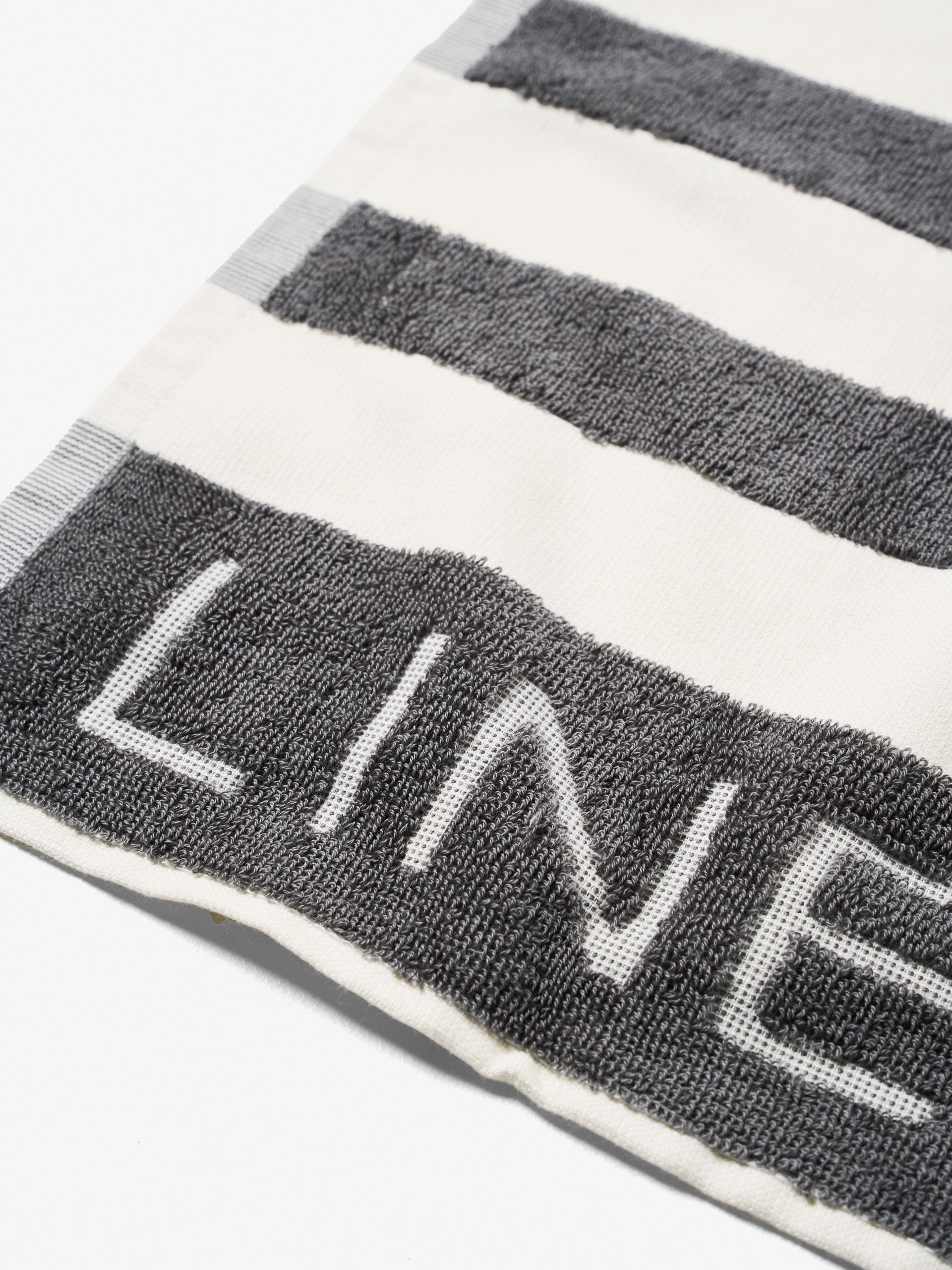 Logo Steel Stripe Tea Towel